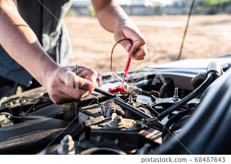 Mechanic repairman checking engine automotive in Mechanic repairman checking engine automotive in 68487643