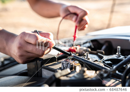 Mechanic repairman checking engine automotive in 68487646