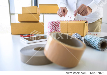 Young business owner work at home receive order Young business owner work at home receive order 68487878