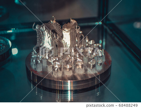 Object printed on metal 3d printer close-up 68488249