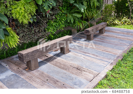 Wood bench made from log. Wood bench made from log. 68488758