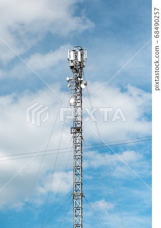 Antenna of Communication Building and blue sky Antenna of Communication Building and blue sky 68490257
