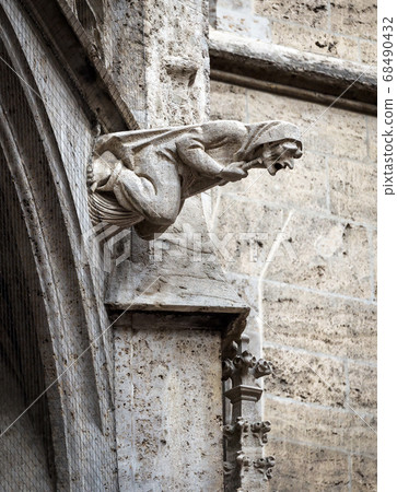 Gargoyle like medieval witch on wall of Rathaus or Gargoyle like medieval witch on wall of Rathaus or 68490432