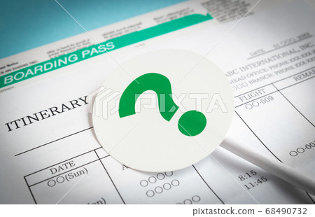 Travel plans and question marks Air tickets, itineraries and seals Trips? 68490732