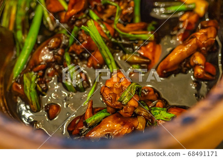 Closeup photo of Singapore style frog porridge with spring onion Closeup photo of Singapore style frog porridge with spring onion 68491171