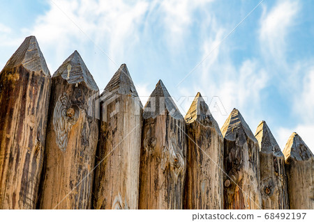 protective wall sharp logs logs old weather-beaten 68492197