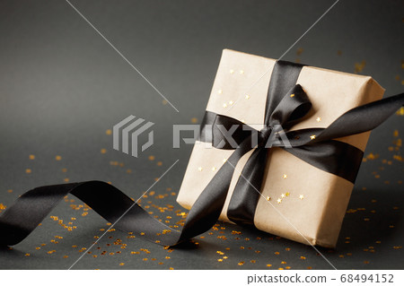 Christmas gifts, presents, ornaments on black Christmas gifts, presents, ornaments on black 68494152