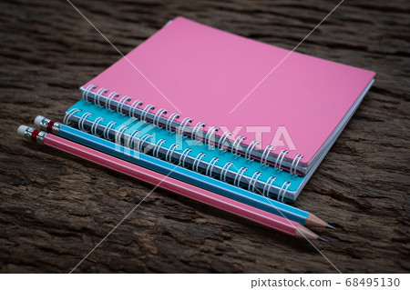 Pencil and book mockup on the old wood desk at the background, Flat lay photo, top view Pencil and book mockup on the old wood desk at the background, Flat lay photo, top view 68495130