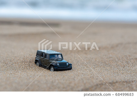 A car running on a rough road A car running on a rough road 68499683
