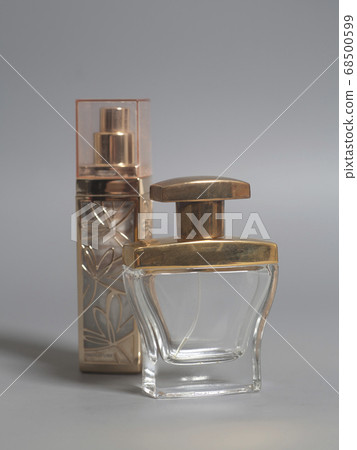 Men's and woman perfume in bottles 68500599