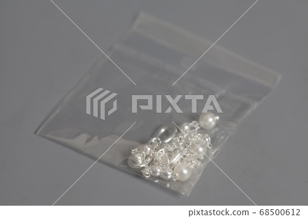 Silver jewelry in a plastic bag Silver jewelry in a plastic bag 68500612