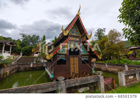 Wat buddha-en or wat Phuttha Eoen,A beautiful old temple in the middle of the valley in Mae Chaem District, Chiang Mai Province. Northern Thailand Wat buddha-en or wat Phuttha Eoen,A beautiful old temple in the middle of the valley in Mae Chaem District, Chiang Mai Province. Northern Thailand 68501379
