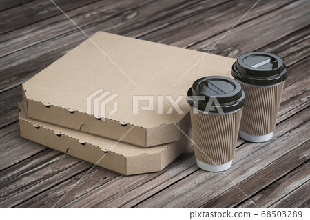 Pizza boxes and coffee plastic cups on vintage 68503289