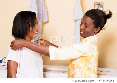 happy young seamstress. 68506964