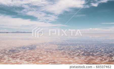 Endless landscapes with reflection like mirror of sky in Salar de Uyuni, Bolivia 68507462