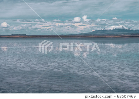 Endless landscapes with reflection like mirror of sky in Salar de Uyuni, Bolivia 68507469