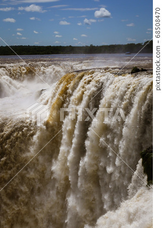 Iguazu Falls on the border of Brazil and Argentina 68508470