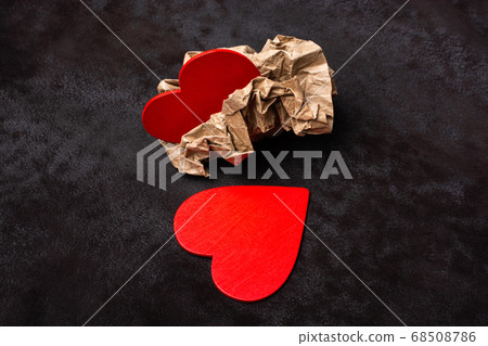 Two red heart icons in wrinkled paper. Valentine 68508786