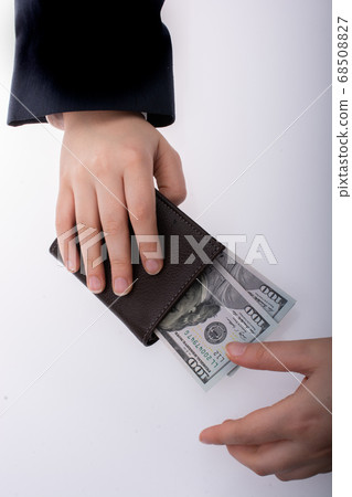 Businessman with US dollar banknotes money and a Businessman with US dollar banknotes money and a 68508827