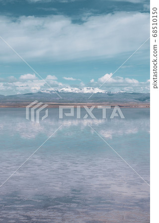 Endless landscapes with reflection like mirror of sky in Salar de Uyuni, Bolivia Endless landscapes with reflection like mirror of sky in Salar de Uyuni, Bolivia 68510150