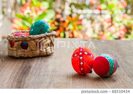 ester egg on wood 68510434
