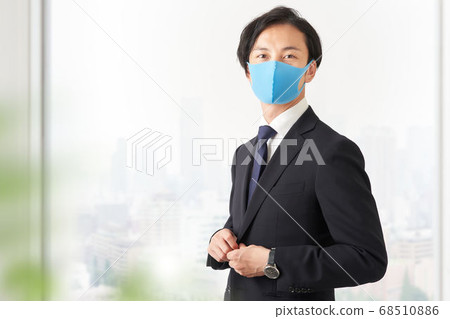 Businessman in a mask 68510886