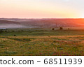 Bright beautiful sunny sunset over the meadow. 68511939