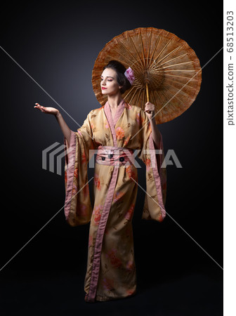 beautiful woman in traditional Japanese kimono beautiful woman in traditional Japanese kimono 68513203