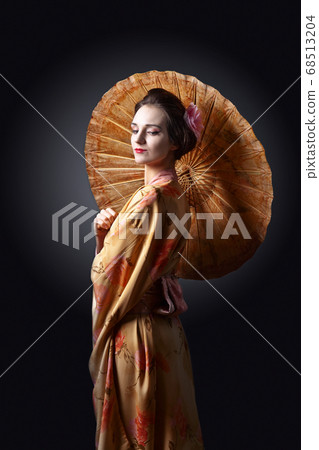beautiful woman in traditional Japanese kimono beautiful woman in traditional Japanese kimono 68513204