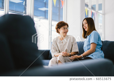 Young doctor consulting senior patient at health care clinic Young doctor consulting senior patient at health care clinic 68513875
