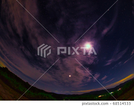 Perseid meteor shower runs under the moon 68514533