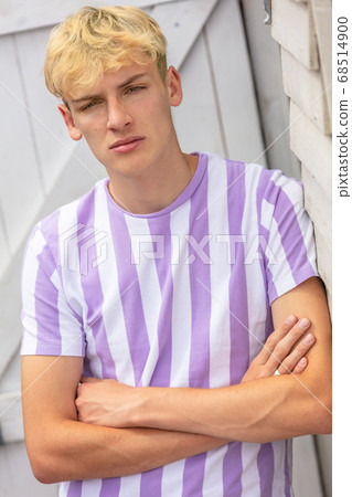 Boy teenager teen blonde male young man wearing striped t-shirt 68514900