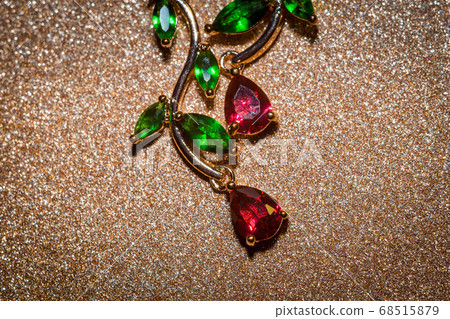 Earrings with red and green zircons 68515879