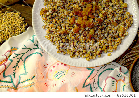 Pearl barley porridge on wooden background Pearl barley porridge on wooden background 68516301