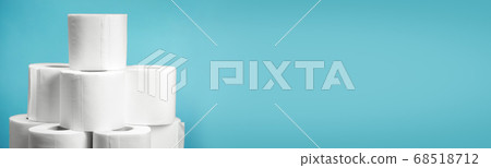 A lot of Toilet paper closeup on blue background 68518712