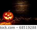Halloween pumpkin head jack on wooden background 68519288