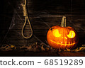 Halloween pumpkin head jack on wooden background 68519289