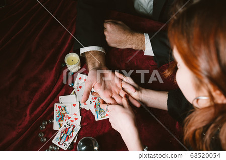 reading the lines hand in a man's hands 68520054