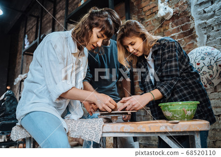 Making a handmade clay pot. Pottery lesson, hobby. 68520110