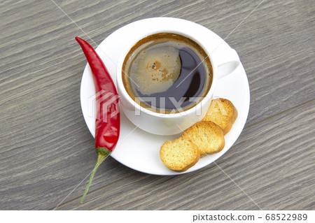 white Cup of black coffee with biscuits white Cup of black coffee with biscuits 68522989