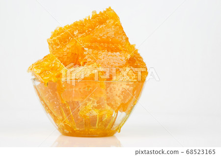briquettes of honeycomb on white background. 68523165