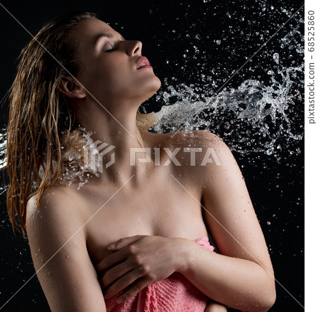 Sexy blonde enjoying water stream and splashes 68525860