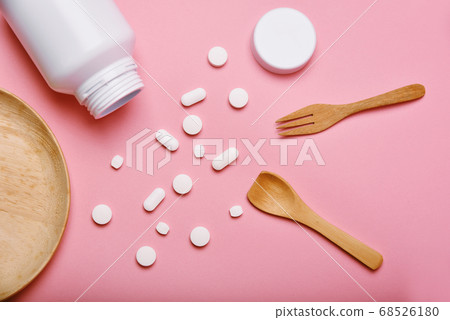 Assorted pharmaceutical medicine, Taking too much medication pills on spoon 68526180