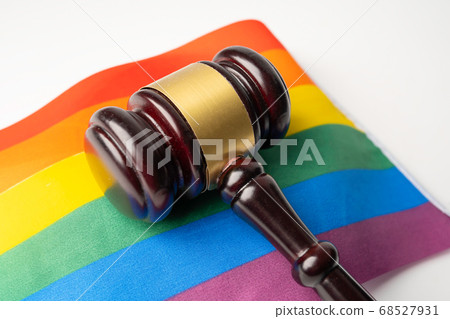 Gavel for judge lawyer on rainbow flag, symbol of 68527931