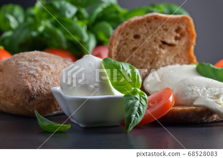 mozzarella with tomato and basil mozzarella with tomato and basil 68528083