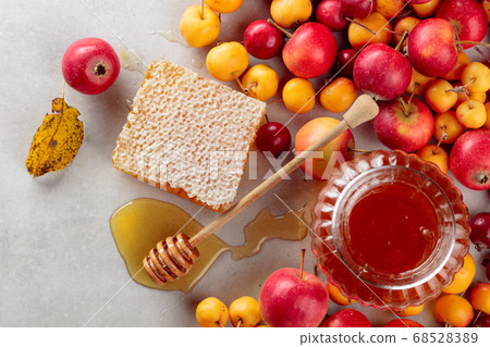 Red and yellow crab apples with honey, healthy 68528389