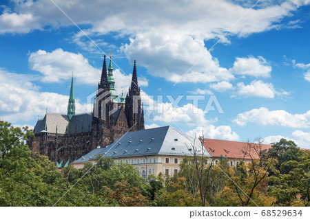 Towers and rooftops of Prague Castle Complex with St Vitus Cathedral, Sternberk and Archbishop palace. Prague Castle Skyline.  68529634