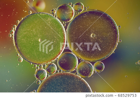 photo of multi-colored drops of oil close-up on a colored background for the background 4 photo of multi-colored drops of oil close-up on a colored background for the background 4 68529753