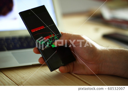 Trader montor chart on smart phone, financial theme. 68532007