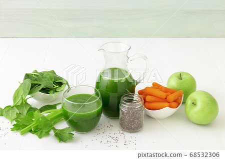 Vegetable smoothie, healthy organic juice made from celery, green apples, spinach leaves and carrot 68532306